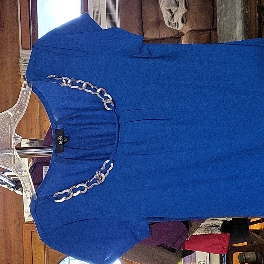 AGB royal blue size M top with silver necklace attached.
